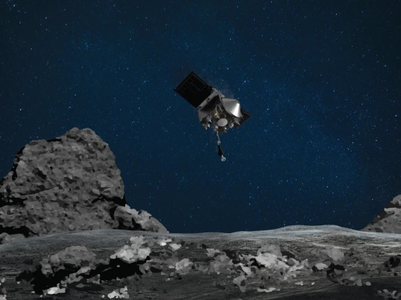 artist&#039;s rendering shows the descending OSIRIS-REx spacecraft 