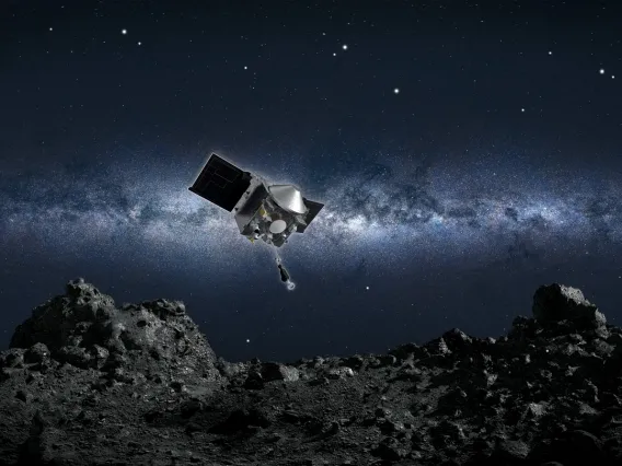 Artist's conception of NASA’s OSIRIS-REx spacecraft collecting a sample from the asteroid Bennu.